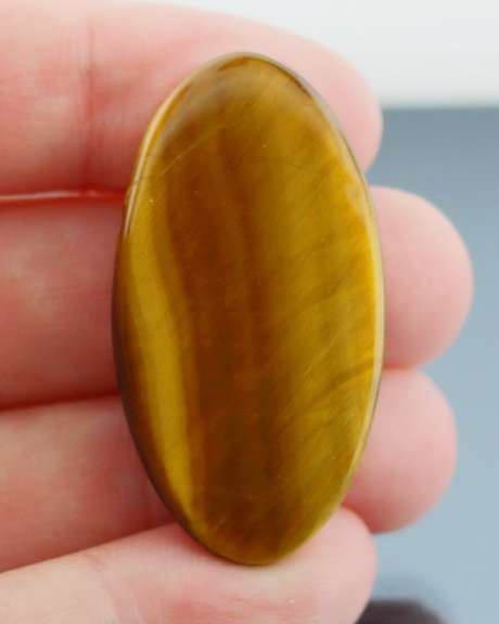 Mezmerizing 43.83ct Tigers Eye cabochon