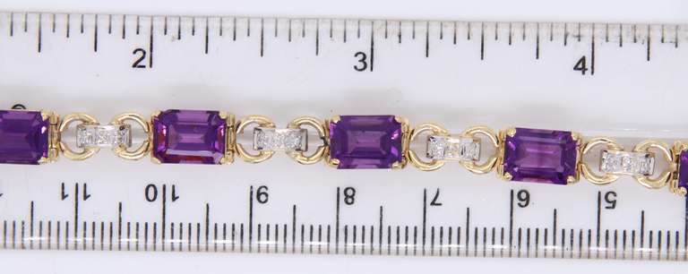 Charming Two Tone Gold Emerald Cut Amethyst and Diamond Station Bracelet