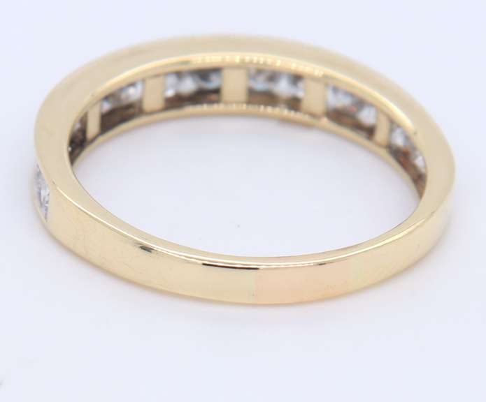 Graceful Yellow Gold Channel Set Diamond Band