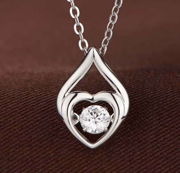 Beautiful Heart with angel's Protection Dancing stone Pendant