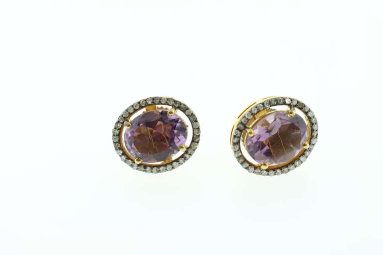 Dazzling Amethyst Core Gold Plated Silver Earrings surround by Diamond Accents