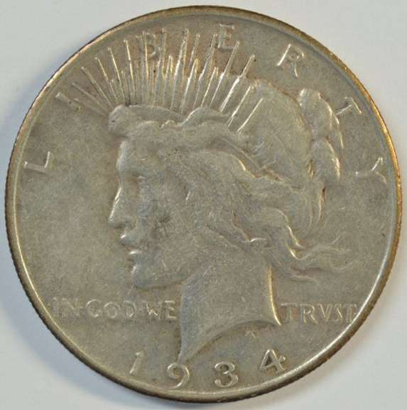 Rare key date 1934-S Peace Silver Dollar. Sharp