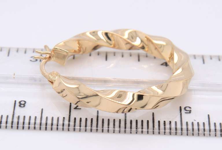 Nice Yellow Gold Twisted Hoop Earrings