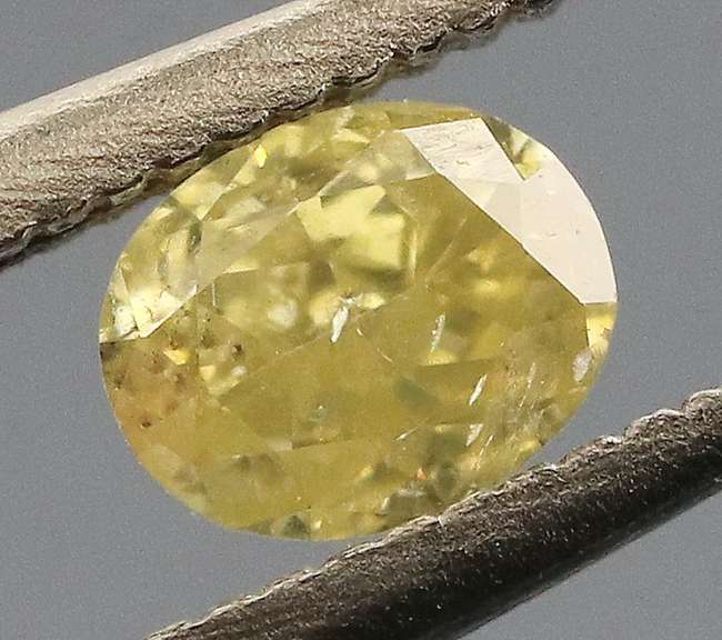 Rare .26ct oval cut yellow Diamond