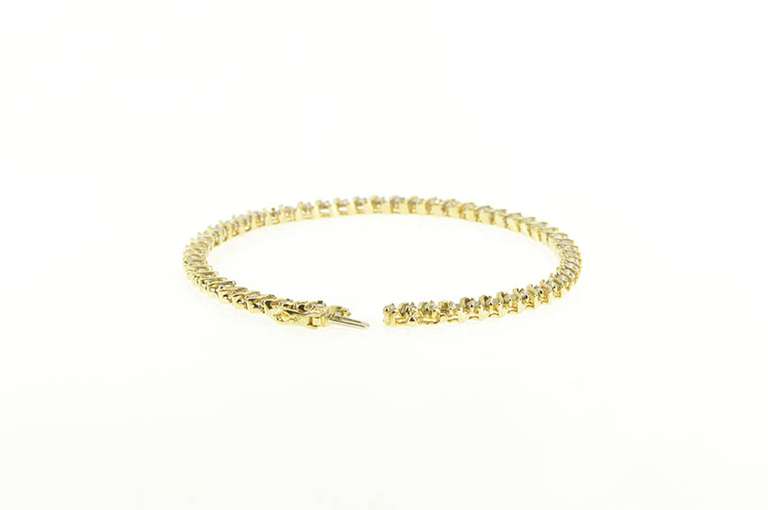 14K Yellow Gold 1.50 Ctw Diamond Wavy Link Classic Tennis Bracelet