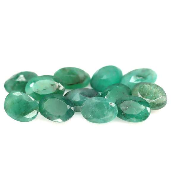 Rich emerald green 7.22ct 12pc emerald set