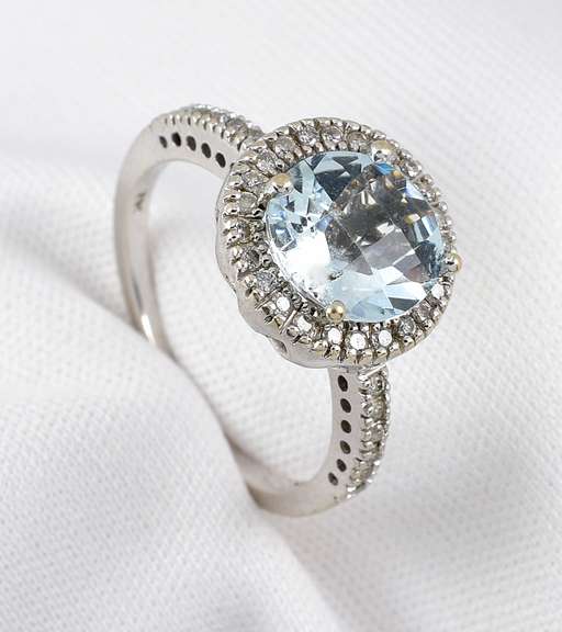 Modern Aquamaring Ring with a Halo of Diamonds