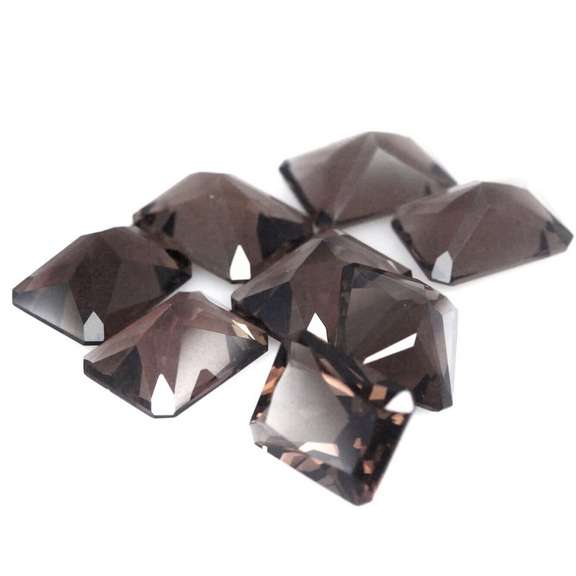 Emerald cut! Unheated! 15.44ct Smoky Quartz set