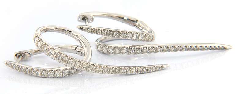 Stylish Swirl Earrings in White Gold with Diamonds