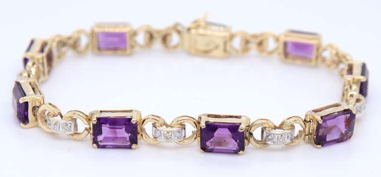 Charming Two Tone Gold Emerald Cut Amethyst and Diamond Station Bracelet