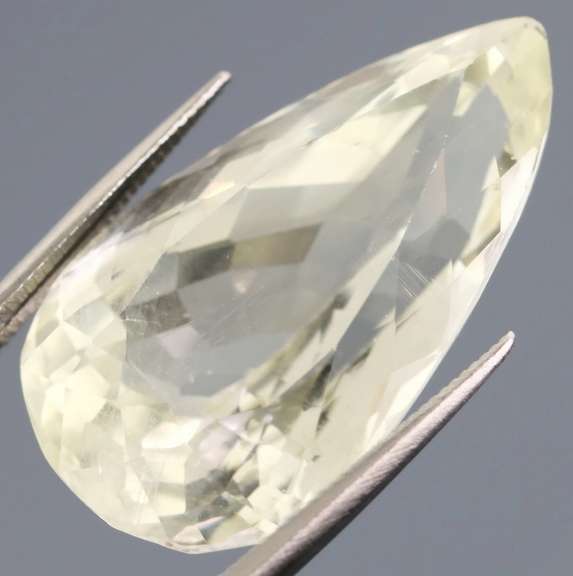 Remarkable 24.41ct high fire platinum blonde Kunzite