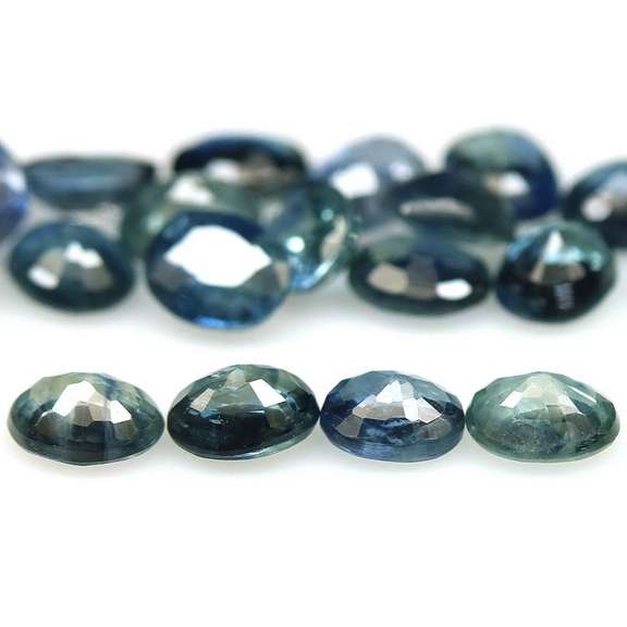Heated only! 8.23ct blue green Sapphire set
