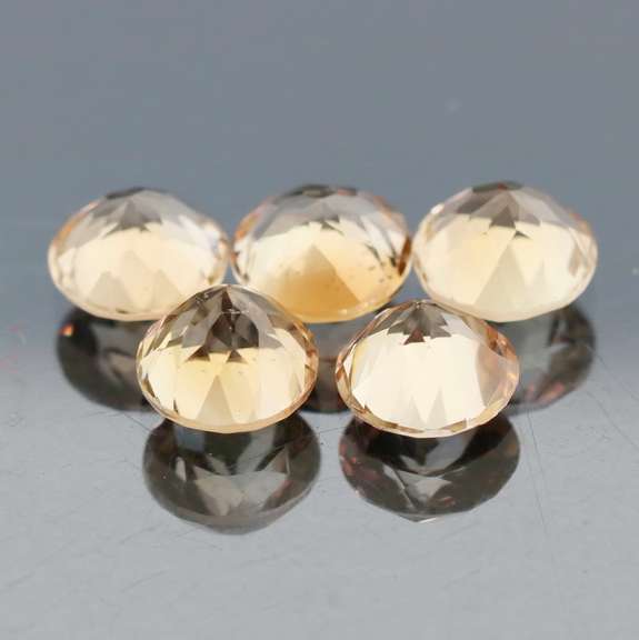 Matched! 5 piece 12.20ct full fire champagne Topaz set