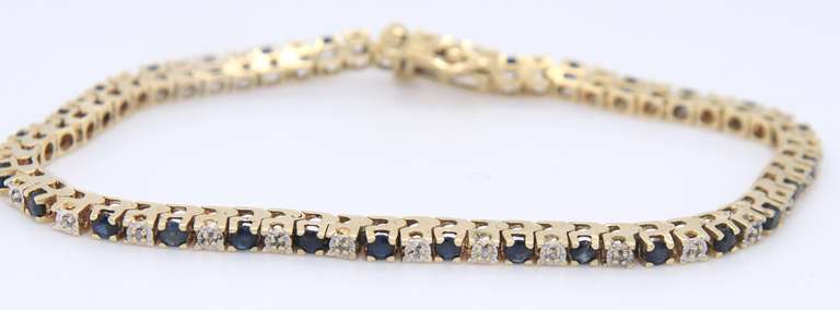 Ideal Yellow Gold Blue Sapphire and Diamond Tennis Bracelet