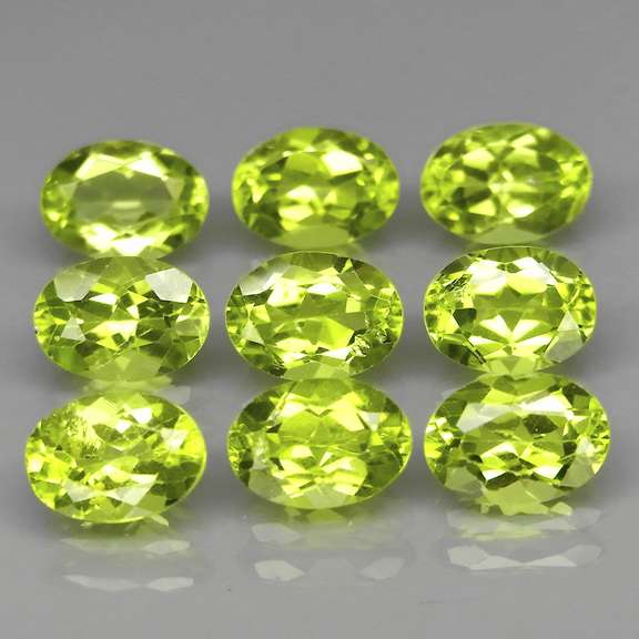 Dazzling 7.85ct untreated apple green Peridot set