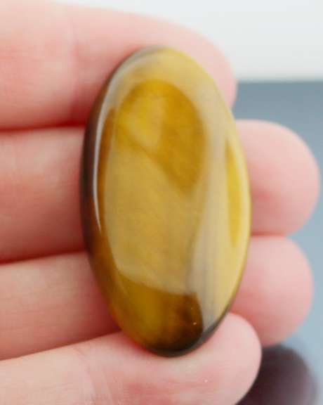 Mezmerizing 43.83ct Tigers Eye cabochon