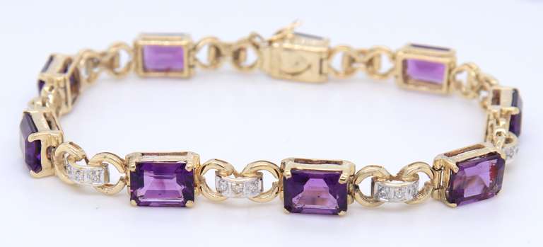 Charming Two Tone Gold Emerald Cut Amethyst and Diamond Station Bracelet