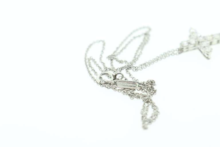 TIFFANY AND CO PLTINUM AND DIAMOND CROSS PENDANT