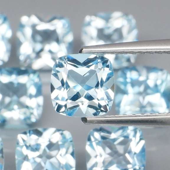 Sky blue 12.98ct cushion cut Topaz set
