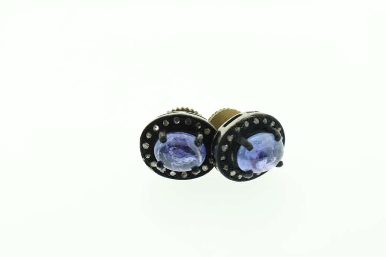Fashinable Round Iolite Earrings with Diamond Accented Dark Silver