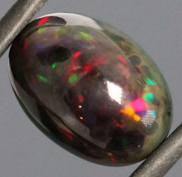 Rainbow block flashing 3.32ct Welo Black Opal!