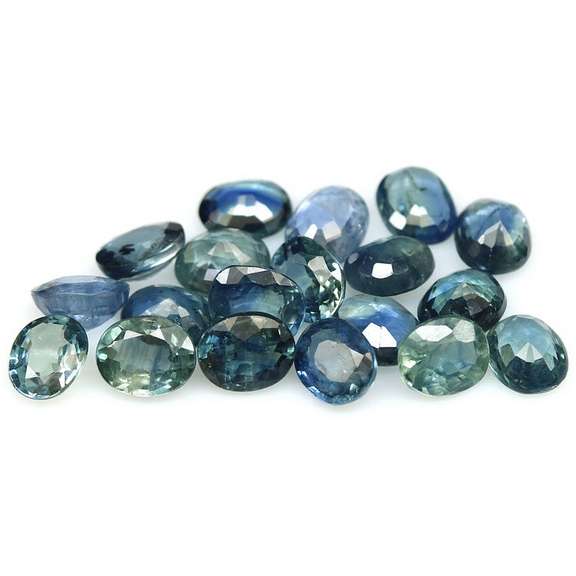 Heated only! 8.23ct blue green Sapphire set