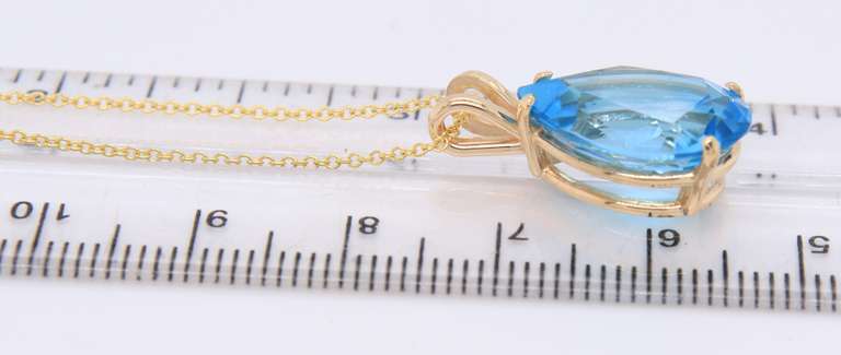 Fabulous Yellow Gold Pear Shaped Blue Topaz pendant on Chain