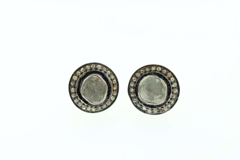 Lovely Mine Cut Diamond Earrings with Dark and Gold Plated Silver engulfed by Diamond Accents