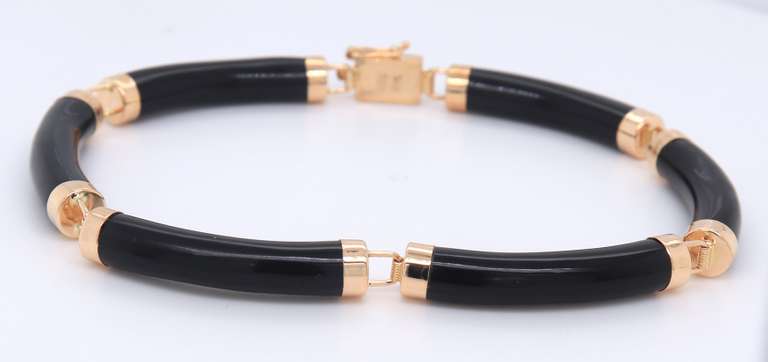 Pleasing Yellow Gold Black Onyx Segment Link Bracelet