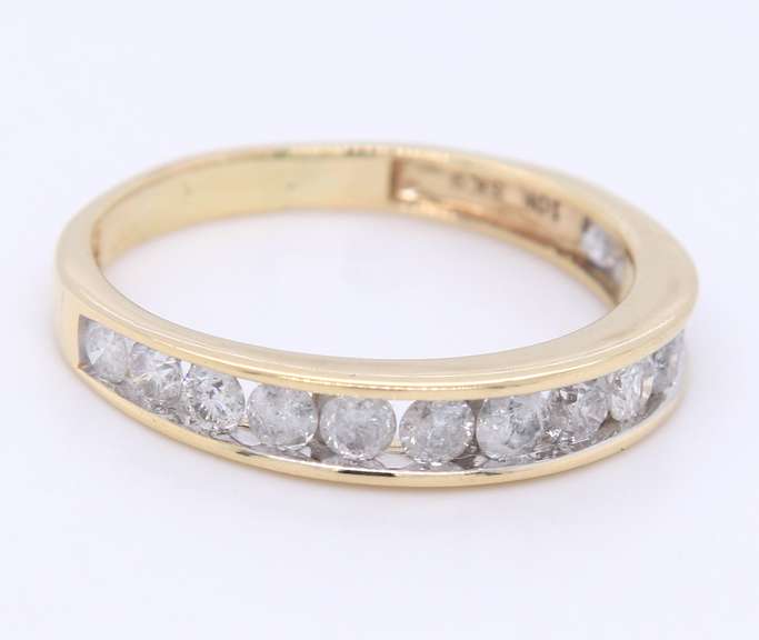 Graceful Yellow Gold Channel Set Diamond Band