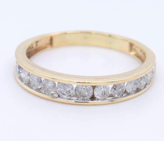 Graceful Yellow Gold Channel Set Diamond Band