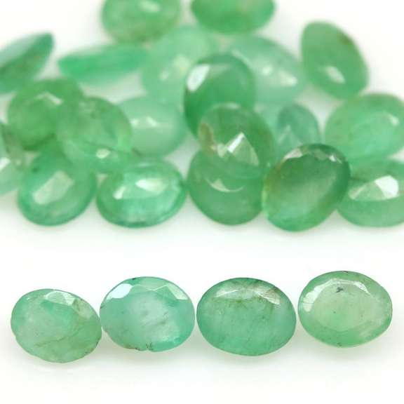 Bright emerald green 6.65ct 24pc emerald set