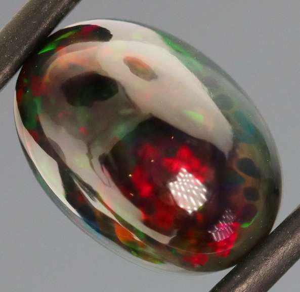 Rainbow block flashing 3.32ct Welo Black Opal!
