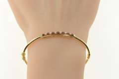 14K Yellow Gold 0.75 Ctw Ruby Diamond Inset Oval Bangle Bracelet