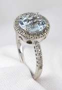 Modern Aquamaring Ring with a Halo of Diamonds