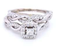 Incredible White Gold Princess Cut Diamond Twisted Engagement Ring with Band