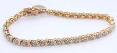 Sterling Silver Cubic Zirconia Tennis Bracelet with Heart Shaped Charm