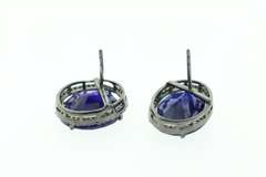 Deep Blue Sapphire Earrings with Silver and edged with Diamonds