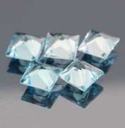 Vivid! 14.09ct radiant cut sky blue Topaz set