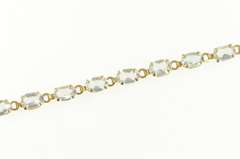 14K Yellow Gold Oval Sim. Blue Topaz Classic Tennis Bracelet
