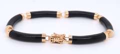 Pleasing Yellow Gold Black Onyx Segment Link Bracelet