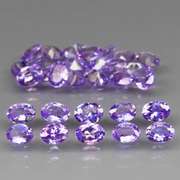 Heavy flashing 4.43ct oval cut Tanzanite set