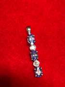 14K WHITE GOLD , DIAMOND AND TANZANITE PENDANT