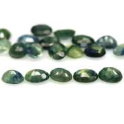 Heated only! 7.58ct blue green Sapphire set