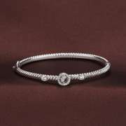 Solid rope style Center stone Dancing Bangle