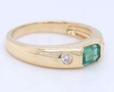 Attractive Yellow Gold Emerald and Diamond Bezel Set Ring