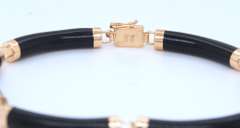 Pleasing Yellow Gold Black Onyx Segment Link Bracelet