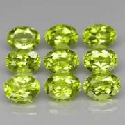 Dazzling 7.64ct untreated apple green Peridot set