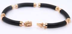 Pleasing Yellow Gold Black Onyx Segment Link Bracelet