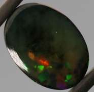 Rainbow block flashing 3.32ct Welo Black Opal!